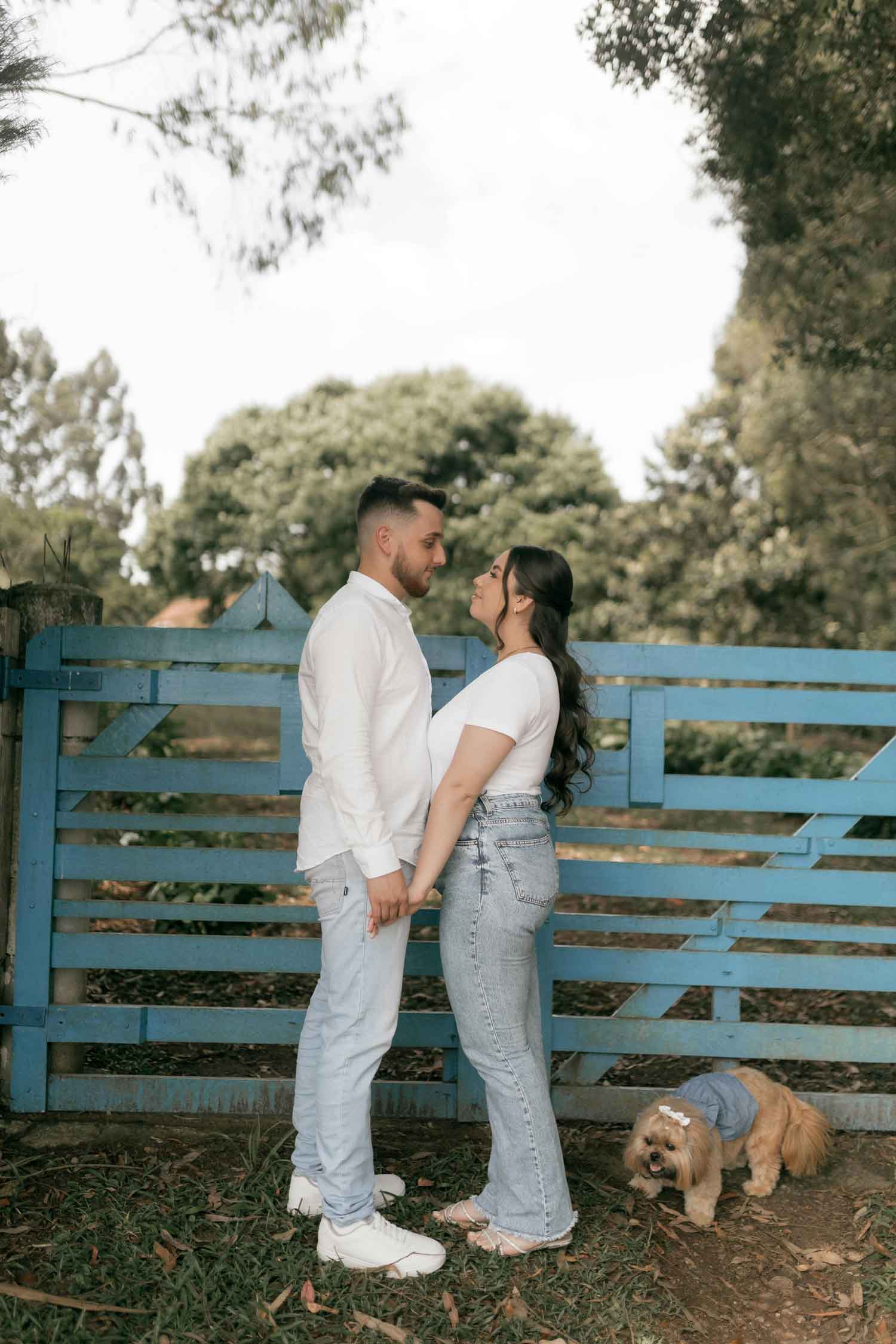 engagement photo with dog casual couple